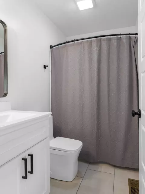 Bath - 705 S Clay St, Nevada, MO 64772 photo 6 of 7