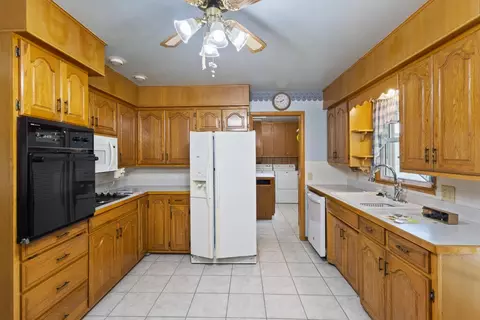 Kitchen - 310 E Carnes St, Wheaton, MO 64874 photo 2 of 2