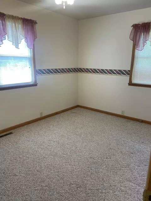 Bedroom - 310 E Carnes St, Wheaton, MO 64874 photo 2 of 6