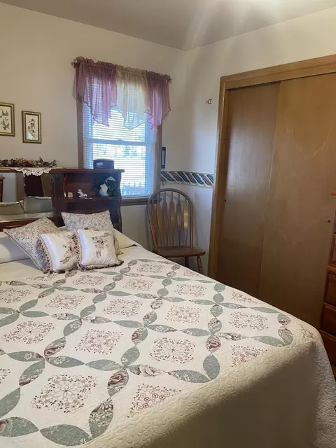 Bedroom - 310 E Carnes St, Wheaton, MO 64874 photo 3 of 6
