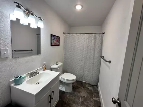 Bath - 1127 E Pacific St, Springfield, MO 65803 photo 1 of 3