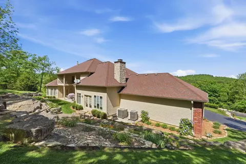Exterior - 109 Cedar Blf, Saddlebrooke, MO 65630 photo 7 of 27