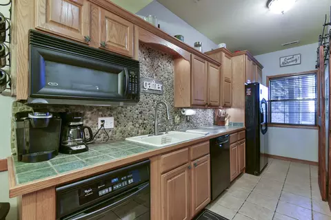 Kitchen - 24 Village Trl #2, Branson, MO 65616 photo 3 of 4