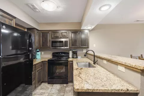 Kitchen - 429 E Chinquapin Cir #504, Indian Point, MO 65616 photo 2 of 3