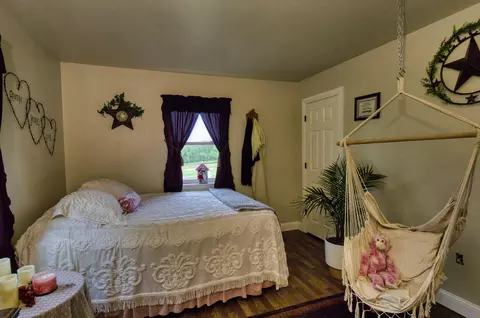 Bedroom - 17522 E N Hwy, Sheldon, MO 64784 photo 10 of 13