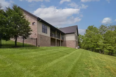 Exterior - 112 Cedar Blf, Saddlebrooke, MO 65630 photo 6 of 11