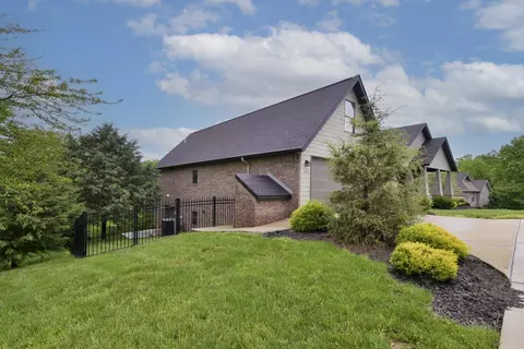 Exterior - 112 Cedar Blf, Saddlebrooke, MO 65630 photo 2 of 11