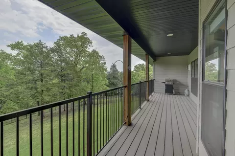 Exterior - 112 Cedar Blf, Saddlebrooke, MO 65630 photo 3 of 11