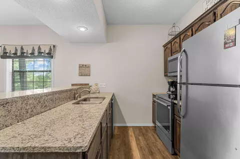 Kitchen - 75 Leaning Tree Cir #4, Indian Point, MO 65616 photo 3 of 3