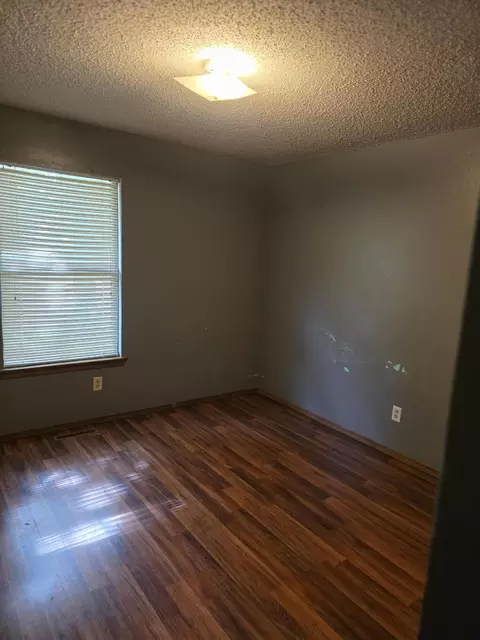 Bedroom - 1001 N 13th Ave, Ozark, MO 65721 photo 4 of 7