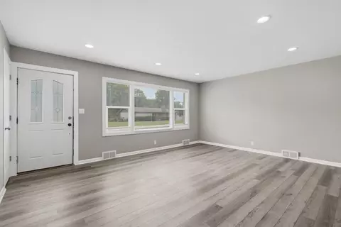Living - 1259 E Berkeley St, Springfield, MO 65804 photo 1 of 7
