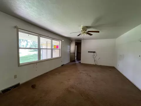 Living - 535 E Jefferson St, Niangua, MO 65713 photo 1 of 1