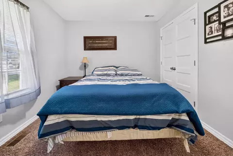 Bedroom - 115 E Seminole St, Strafford, MO 65757 photo 5 of 10