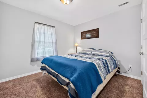 Bedroom - 115 E Seminole St, Strafford, MO 65757 photo 4 of 10