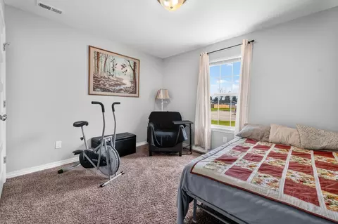 Bedroom - 115 E Seminole St, Strafford, MO 65757 photo 7 of 10