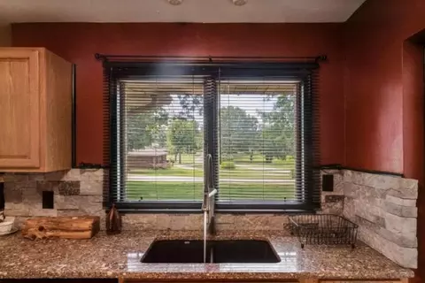 Kitchen - 301 E Walnut St, Aurora, MO 65605 photo 2 of 3