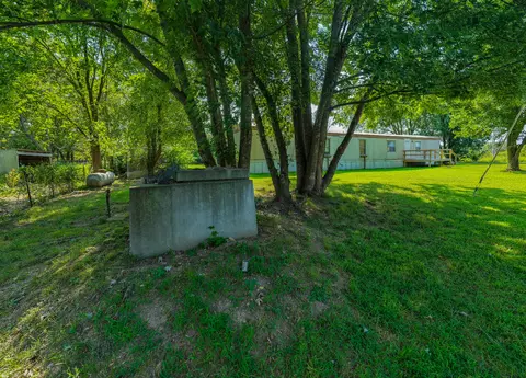 Exterior - 1909 E 505th Rd, Halfway, MO 65663 photo 8 of 13