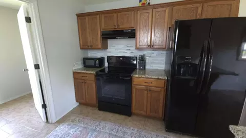 Kitchen - 1401 S 13th St, Ozark, MO 65721 photo 1 of 2