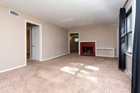 Living - 1427 S Pickwick Ave, Springfield, MO 65804 photo 2 of 7