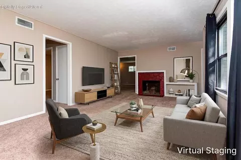 Living - 1427 S Pickwick Ave, Springfield, MO 65804 photo 1 of 7