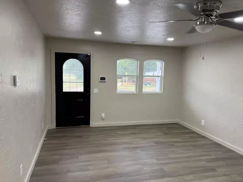 Living - 212 E Delta St, Aurora, MO 65605 photo 1 of 2