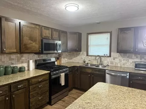 Kitchen - 911 E 10th St, Mountain Grove, MO 65711 photo 1 of 3