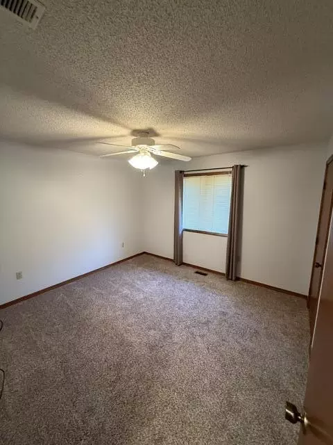 Bedroom - 807 E 16th St, Mountain Grove, MO 65711 photo 3 of 6