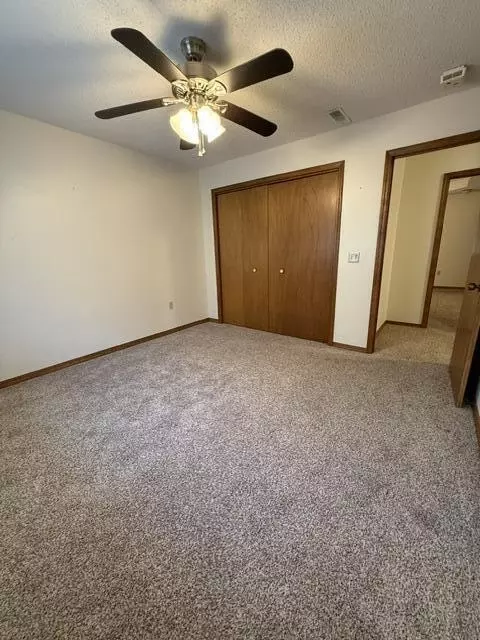 Bedroom - 807 E 16th St, Mountain Grove, MO 65711 photo 2 of 6