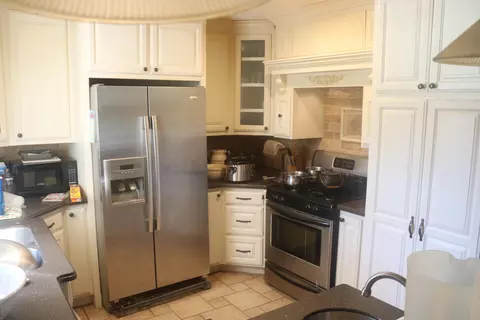 Kitchen - 300 S Holmes Ave, Wheaton, MO 64874 photo 2 of 4