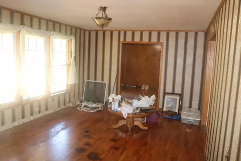 Living - 300 S Holmes Ave, Wheaton, MO 64874 photo 1 of 4