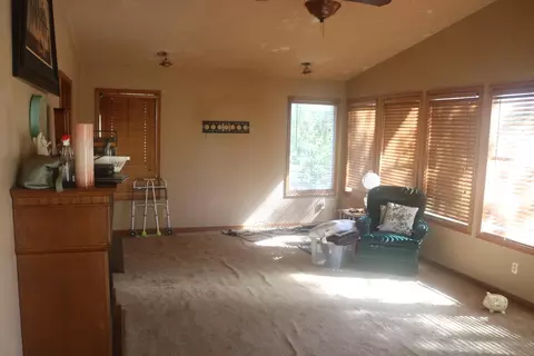 Living - 300 S Holmes Ave, Wheaton, MO 64874 photo 2 of 4