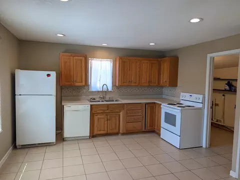 Kitchen - 1001 E Chestnut St, Bolivar, MO 65613 photo 1 of 2