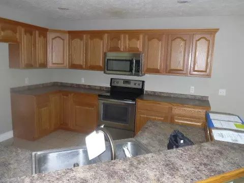 Kitchen - 1209 S 21st Ave, Ozark, MO 65721 photo 2 of 2