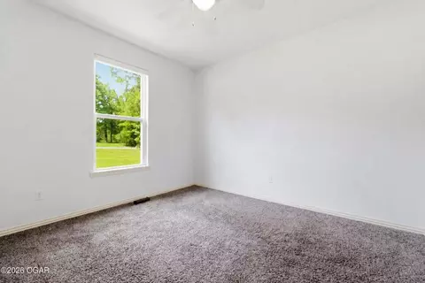 Bedroom - 43 Oakridge Dr, Pineville, MO 64856 photo 5 of 7
