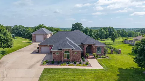 Exterior - 332 Sunset Dr, Saddlebrooke, MO 65630 photo 4 of 21