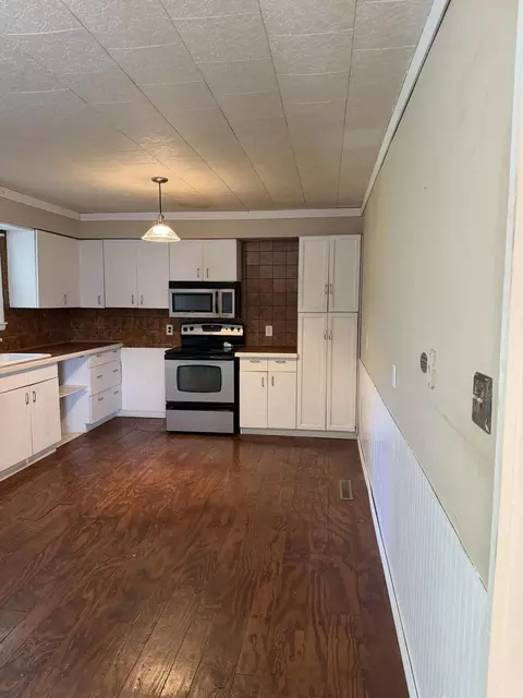 Kitchen - 310 E 4th St, Mountain View, MO 65548 photo 5 of 5
