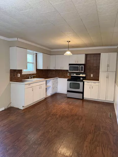 Kitchen - 310 E 4th St, Mountain View, MO 65548 photo 3 of 5