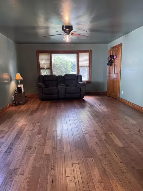 Living - 1125 S Main Ave, Springfield, MO 65807 photo 1 of 2