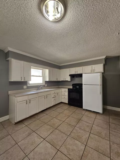 Kitchen - 1406 W Calhoun St #A-B, Springfield, MO 65802 photo 1 of 5
