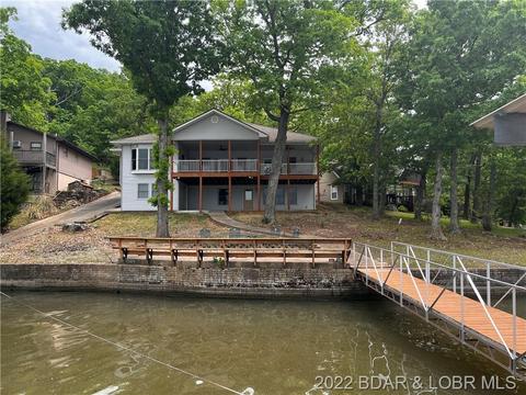 709 Swaying Oak Dr, Roach, MO 65787 photo 1