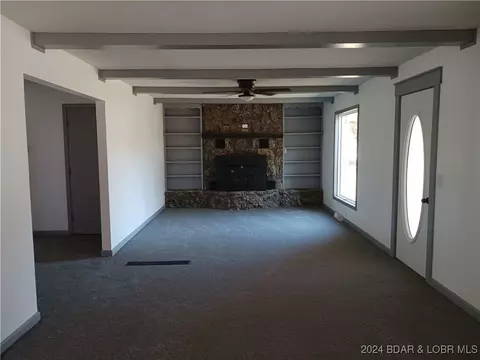 Living - 607 N Hughes Ave, Stover, MO 65078 photo 1 of 6