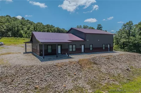 Exterior - 26450 Eaglepoint Road Apt Rd #(70' LAKEFRONT), Barnett, MO 65011 photo 6 of 7