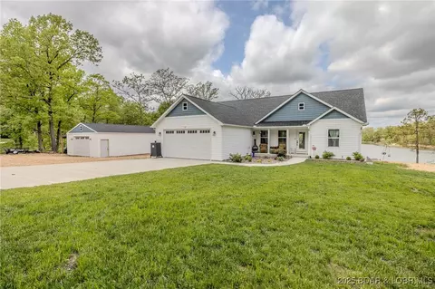 735 Lake Of The Woods Dr, Macks Creek, MO 65786