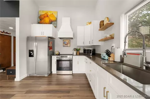 Kitchen - 805 Robin Hood Ln, Roach, MO 65787 photo 3 of 5