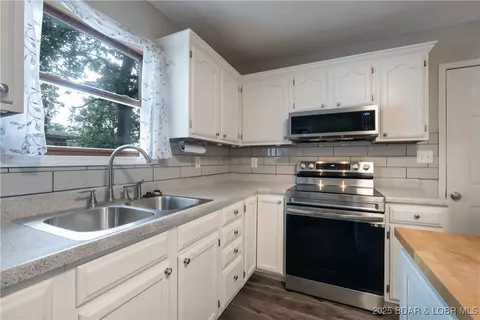Kitchen - 712 Passover Rd, Osage Beach, MO 65065 photo 1 of 2