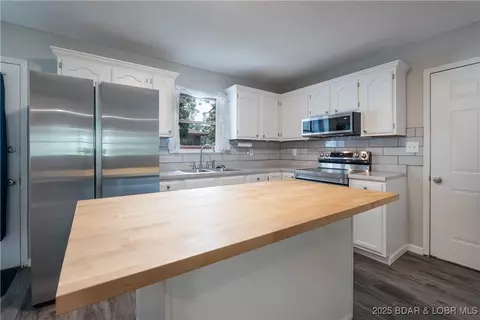 Kitchen - 712 Passover Rd, Osage Beach, MO 65065 photo 2 of 2