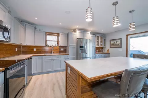 Kitchen - 30857 Berry Rd, Stover, MO 65078 photo 2 of 6