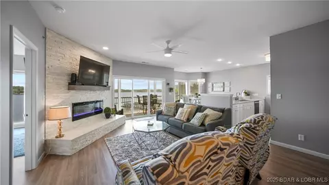 Living - 492 Regatta Bay Dr #4E, Lake Ozark, MO 65049 photo 2 of 7
