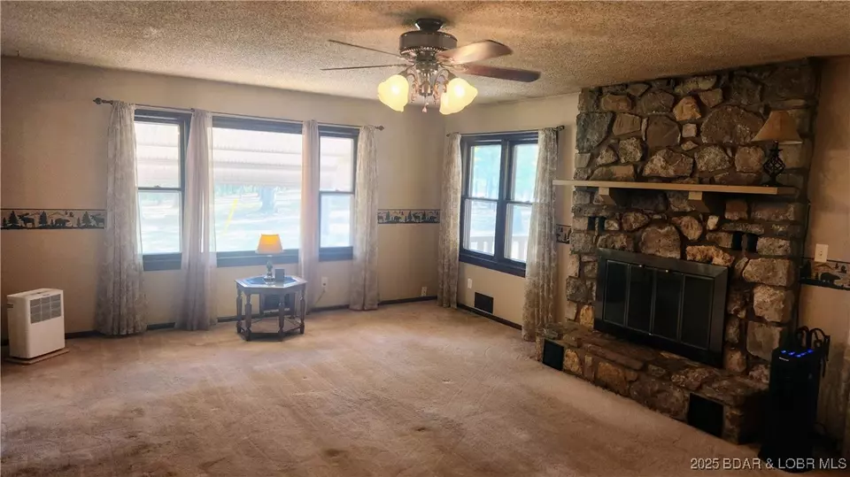 Living - 29551 Stoney Oak Dr, Gravois Mills, MO 65037 photo 1 of 3