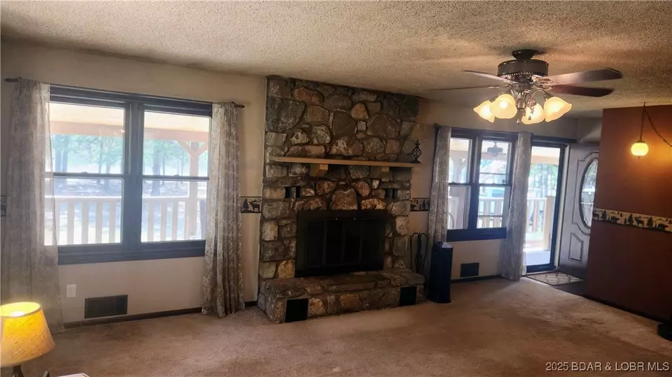 Living - 29551 Stoney Oak Dr, Gravois Mills, MO 65037 photo 2 of 3